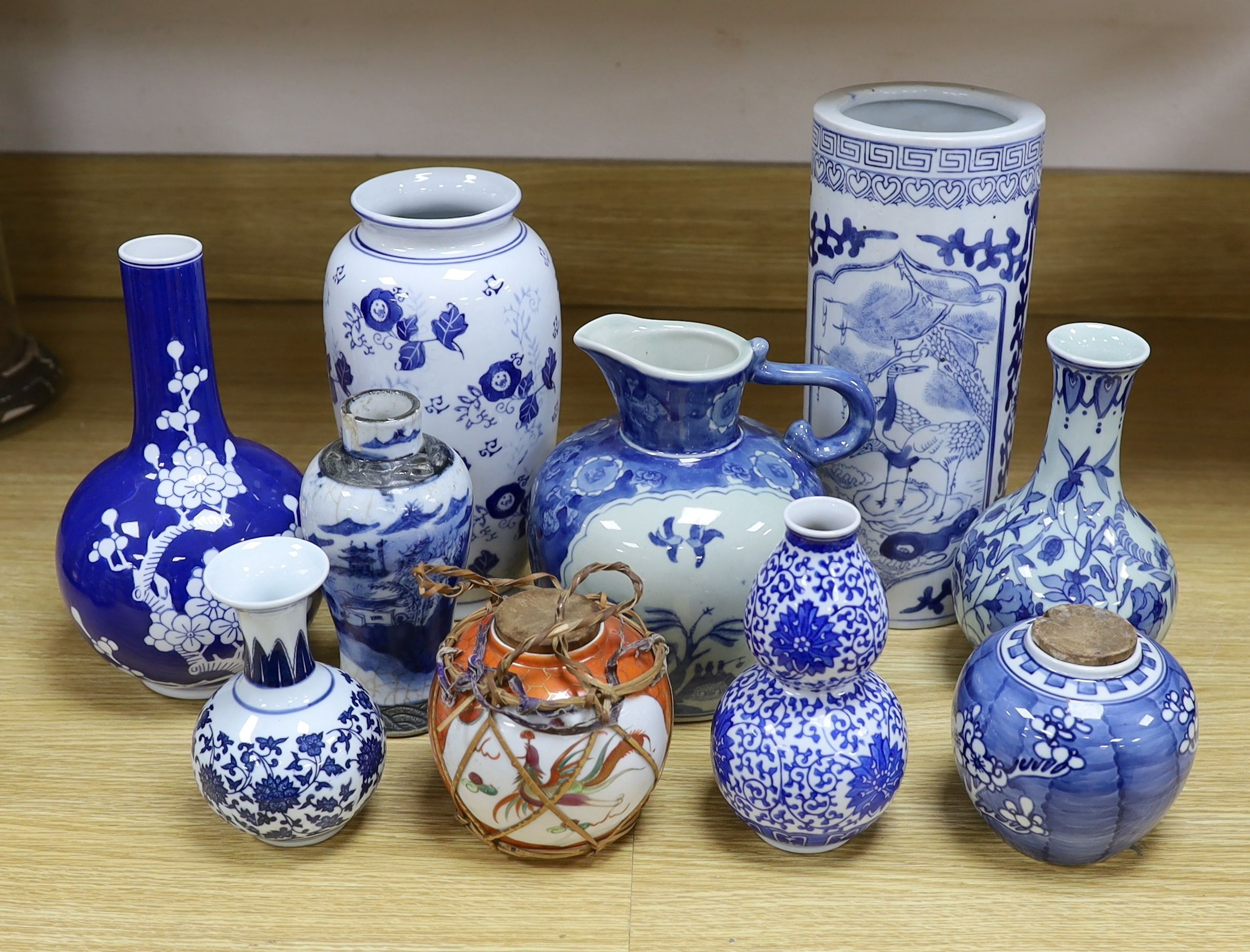 A group of Chinese blue and white porcelain including an early 20th century vase, tallest 28cm